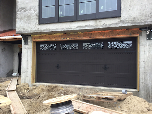 Wrought iron garage door installation