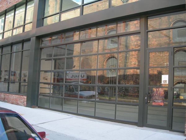 Large overhead glass commercial door